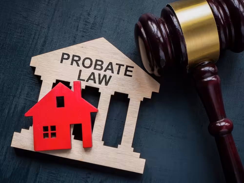 Gavel with sign that says Probate Law and a little home cutout.